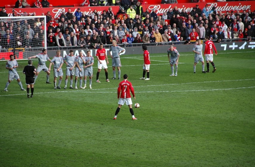Cristiano Ronaldo preparing to take a free kick in a 2009 match