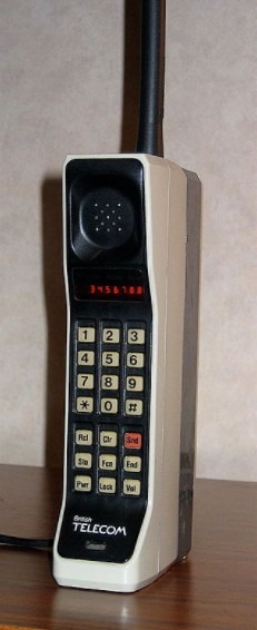 a photo of the first commercially available mobile, DynaTAC 8000X