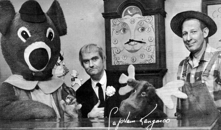 black and white photo of Dancing Bear, Bunny Rabbit, Captain Kangaroo, Grandfather Clock, Mister Moose, and Mister Green Jeans