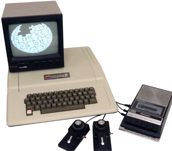 the Apple II with a cassette deck and game paddles
