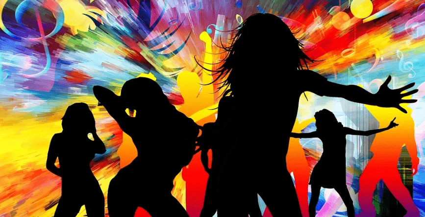 female silhouettes dancing to pop music
