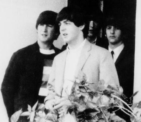 Paul McCartney in the middle with the Beatles in 1964
