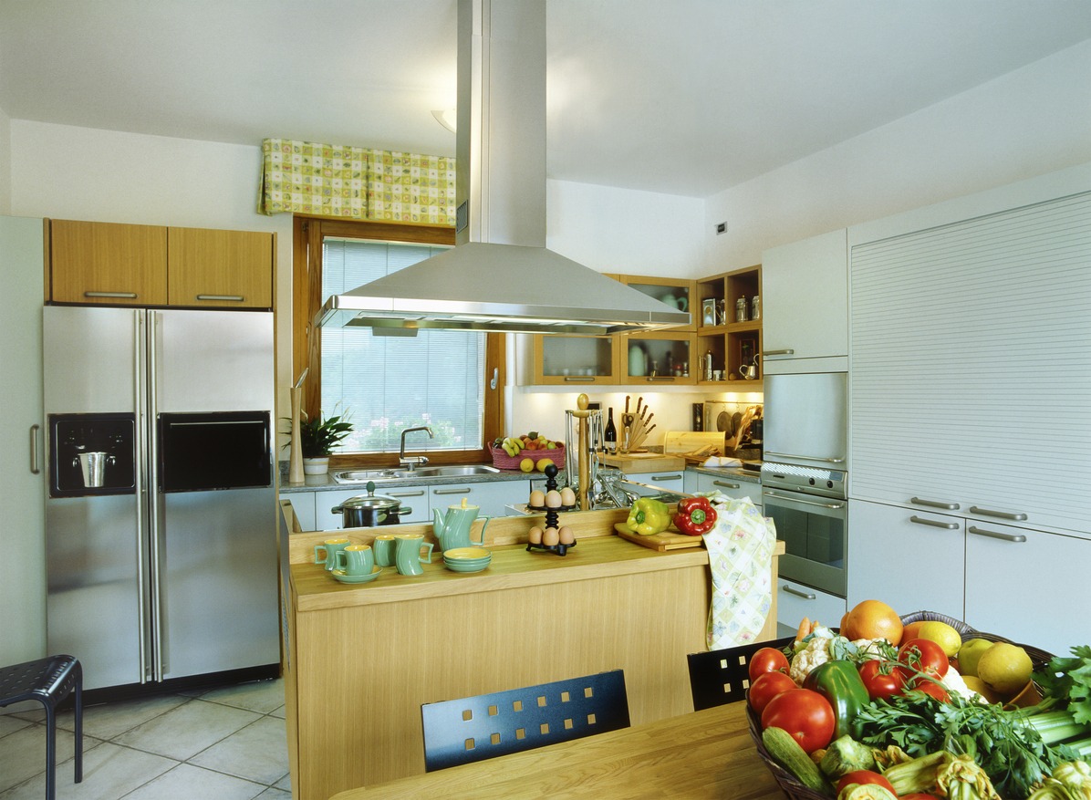 a kitchen with more modern appliances