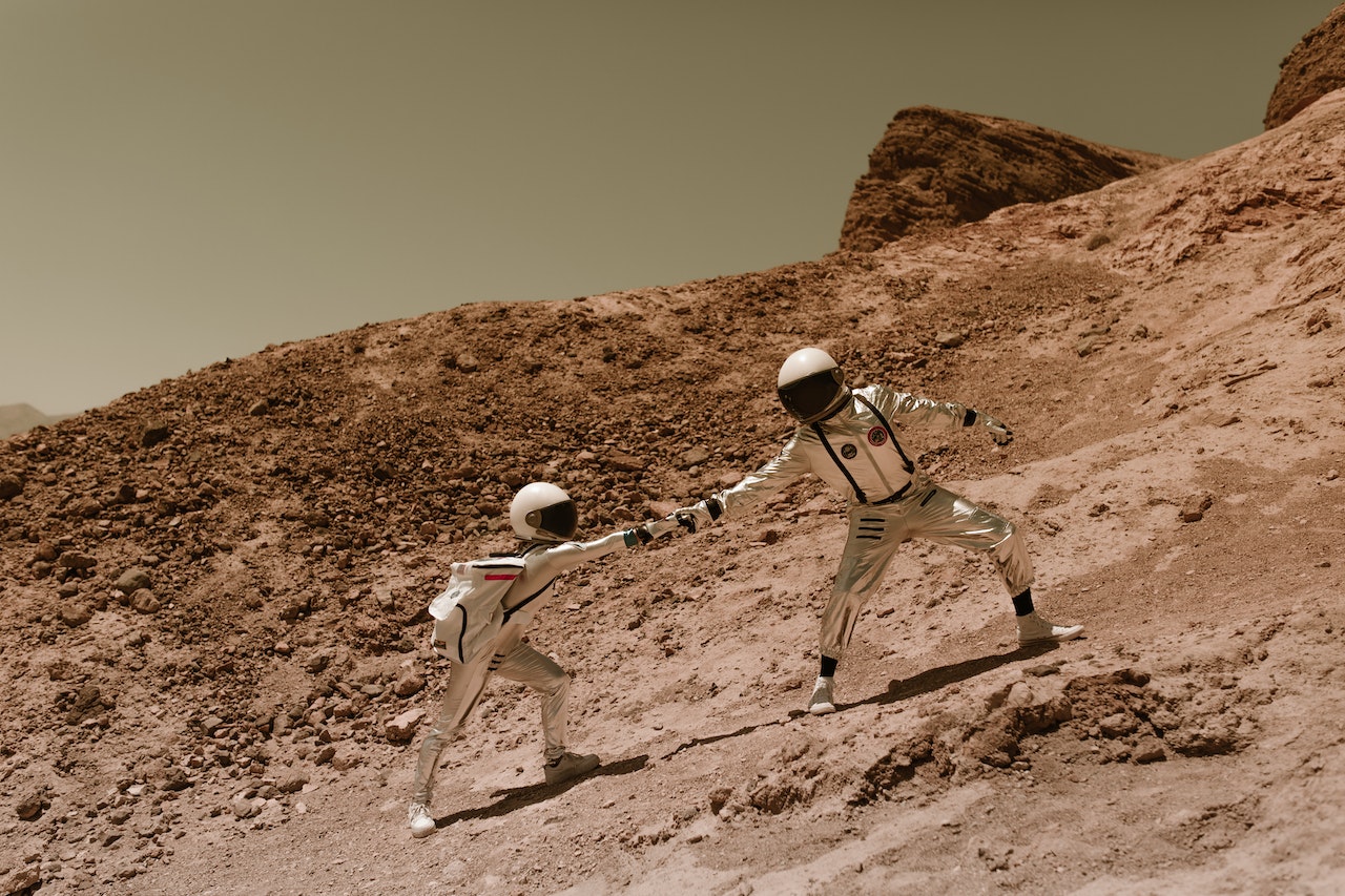 astronauts on dry soil