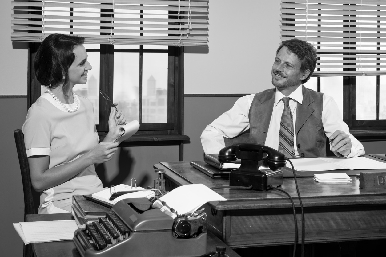 two people talking in an office