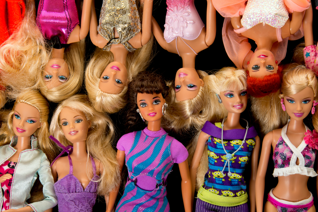 Albuquerque, USA - June 15, 2012: Studio shot of a pile of Barbie fashion dolls. Barbie dolls are have been manufactured by Mattel, Inc. since1959