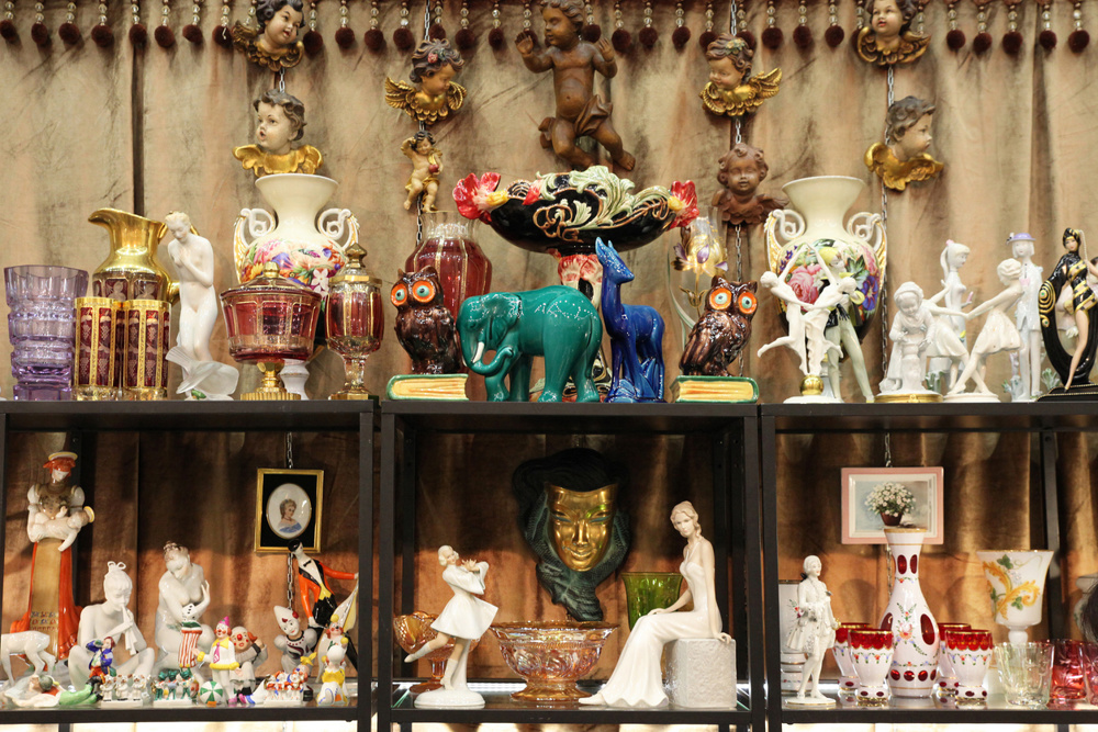 Shelf with assorted vintage figurines